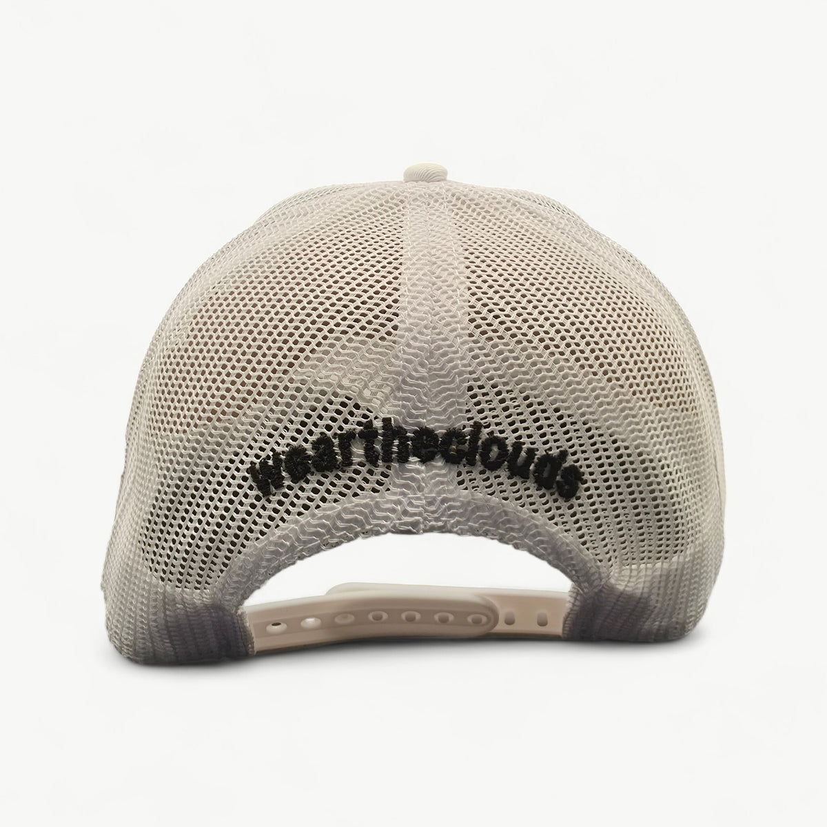 Above The Clouds white trucker cap – back view with weartheclouds logo