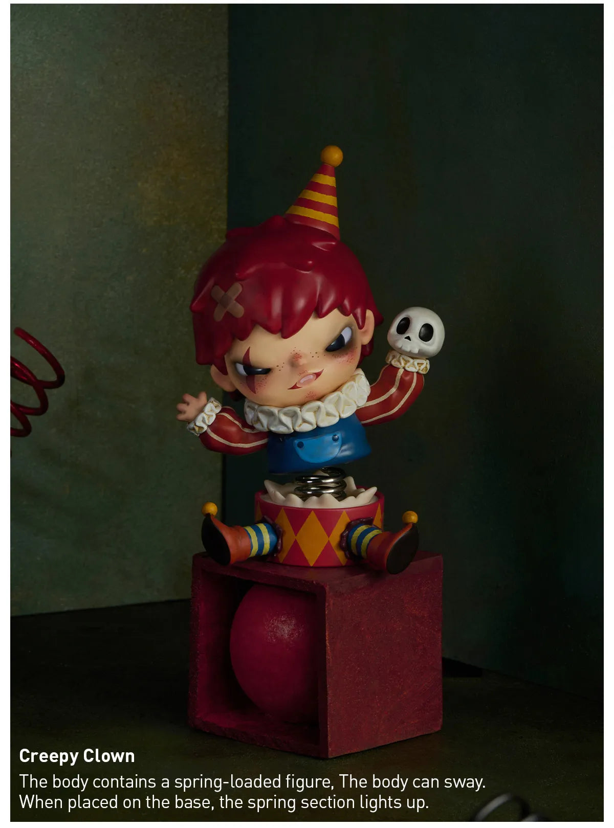 Toy figure of a clown with a spring-loaded mechanism on a dark. Collectible Labubu pop mart toys Hirono Mini Figues background