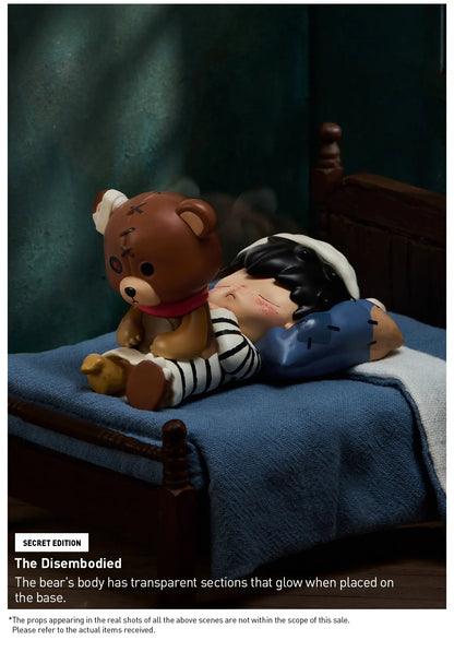 Toy bear with transparent sections on a bed with text about product features. Collectible Labubu pop mart toys Hirono Mini Figues