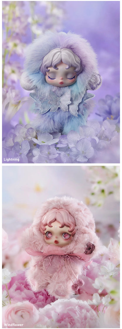 Two dolls in winter-themed outfits with floral backgrounds. SkullPanda Toys Collectibles Dubai Rare Labubu