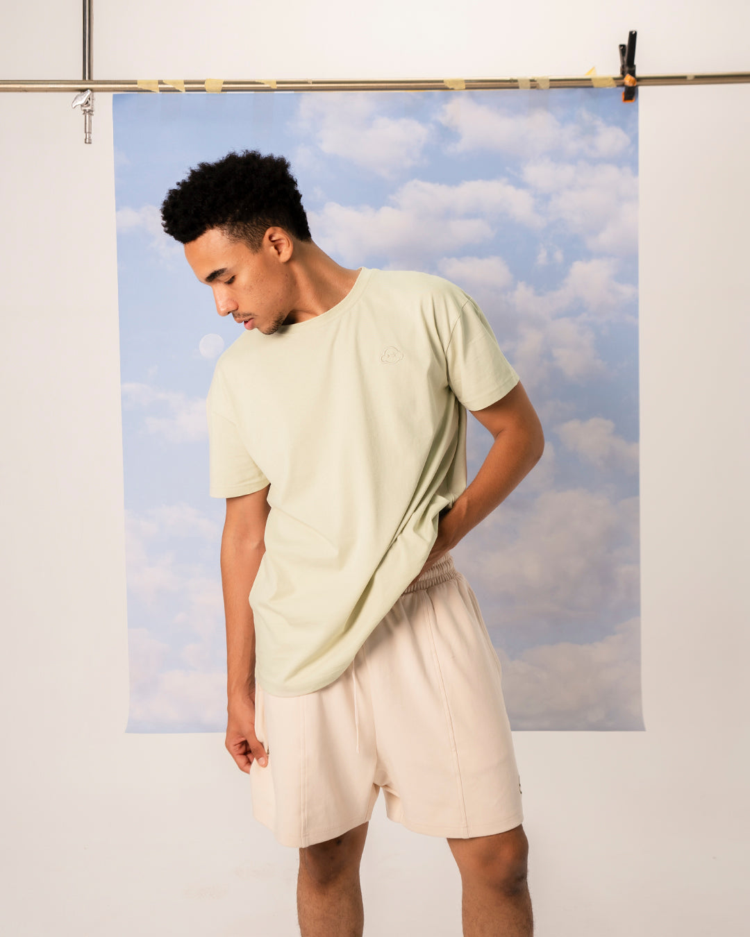 White cotton activewear pants with a small black logo on the left leg, featuring a relaxed fit and drawstring waist. 100% Cotton available in Dubai same day delivery best of summer and winter casual streetwear unisex men and women shorts and t-shirts available in UAE fast delivery and same day delivery available Pants joggers jogger pants