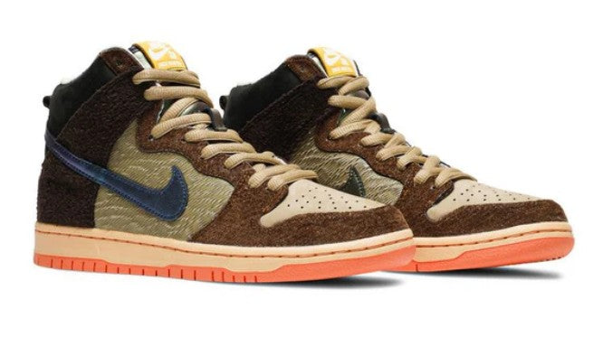 Pair of high-top sneakers with camouflage pattern and colorful sole on a white background. Nike shoes Jordans dunks 