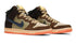 Pair of high-top sneakers with camouflage pattern and colorful sole on a white background. Nike shoes Jordans dunks 