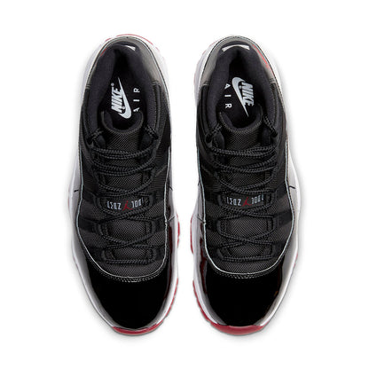Black Nike Air sneakers with red accents on a white background. Nike shoes Jordans dunks 
