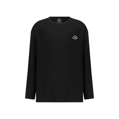 A black long sleeve cotton t-shirt with a small white logo on the left chest area, presented in a relaxed fit style. White cotton activewear pants with a small black logo on the left leg, featuring a relaxed fit and drawstring waist. 100% Cotton available in Dubai same day delivery best of summer and winter casual streetwear unisex men and women shorts and t-shirts available in UAE fast delivery and same day delivery available Pants joggers jogger pants