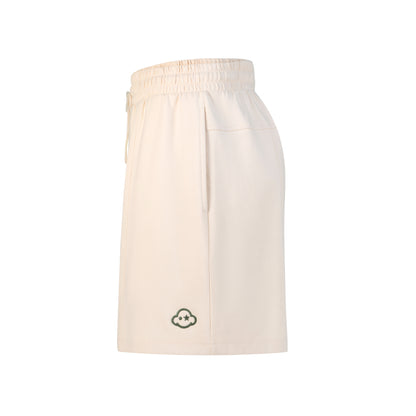 White cotton activewear pants with a small black logo on the left leg, featuring a relaxed fit and drawstring waist. 100% Cotton available in Dubai same day delivery best of summer and winter casual streetwear unisex men and women shorts and t-shirts available in UAE fast delivery and same day delivery available Pants joggers jogger pants