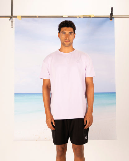 White cotton activewear pants with a small black logo on the left leg, featuring a relaxed fit and drawstring waist. 100% Cotton available in Dubai same day delivery best of summer and winter casual streetwear unisex men and women shorts and t-shirts available in UAE fast delivery and same day delivery available Pants joggers jogger pants