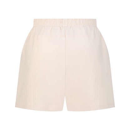 White cotton activewear pants with a small black logo on the left leg, featuring a relaxed fit and drawstring waist. 100% Cotton available in Dubai same day delivery best of summer and winter casual streetwear unisex men and women shorts and t-shirts available in UAE fast delivery and same day delivery available Pants joggers jogger pants