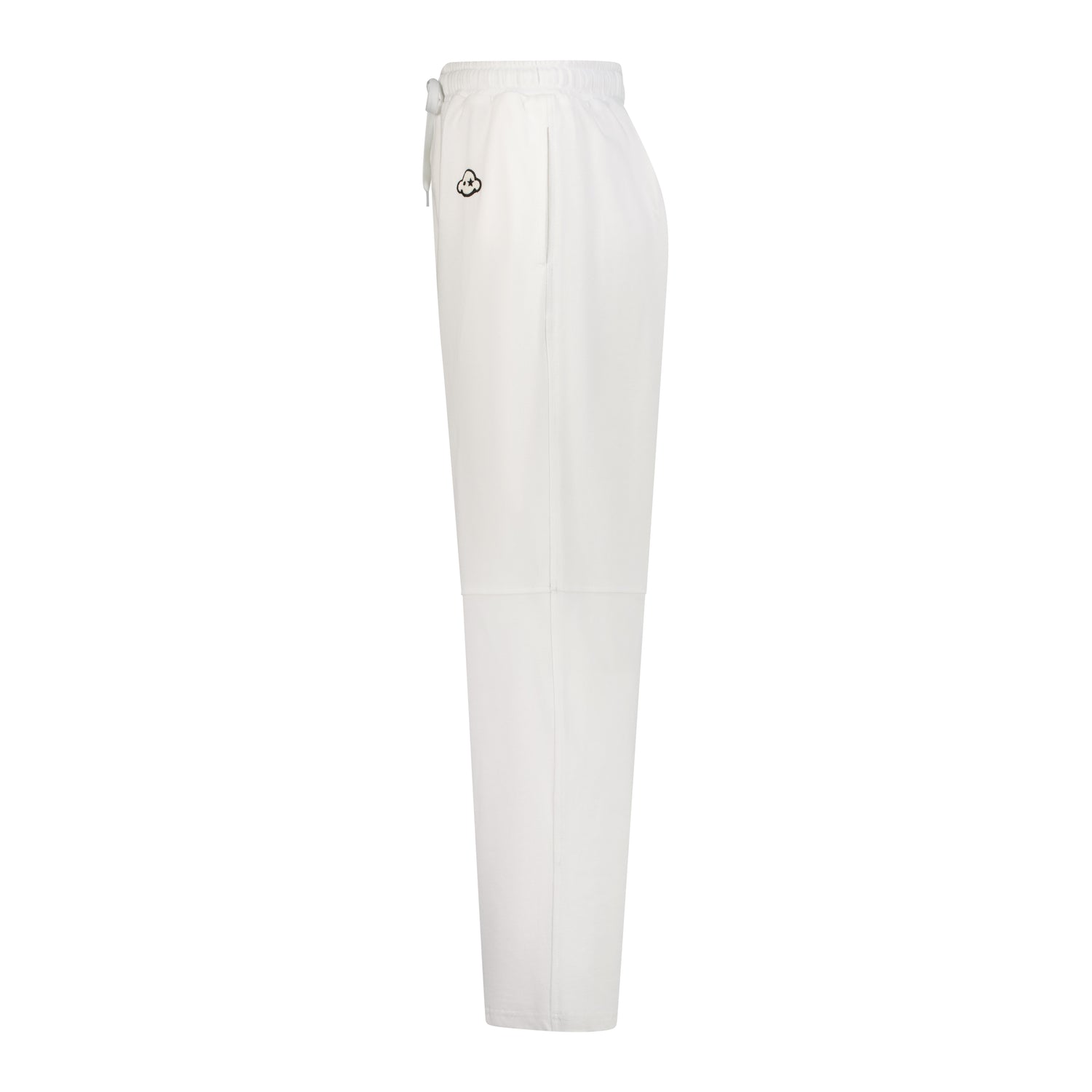 White cotton activewear pants with a small black logo on the left leg, featuring a relaxed fit and drawstring waist. 100% Cotton available in Dubai same day delivery best of summer and winter casual streetwear unisex men and women shorts and t-shirts available in UAE fast delivery and same day delivery available Pants joggers jogger pants